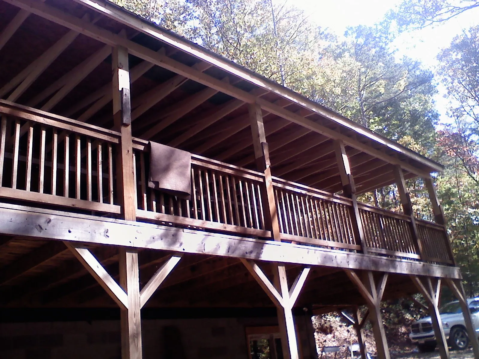 Timber framing under a new elevated porch and deck — Roof Leak Repair in Pond Eddy by Roofing Brothers